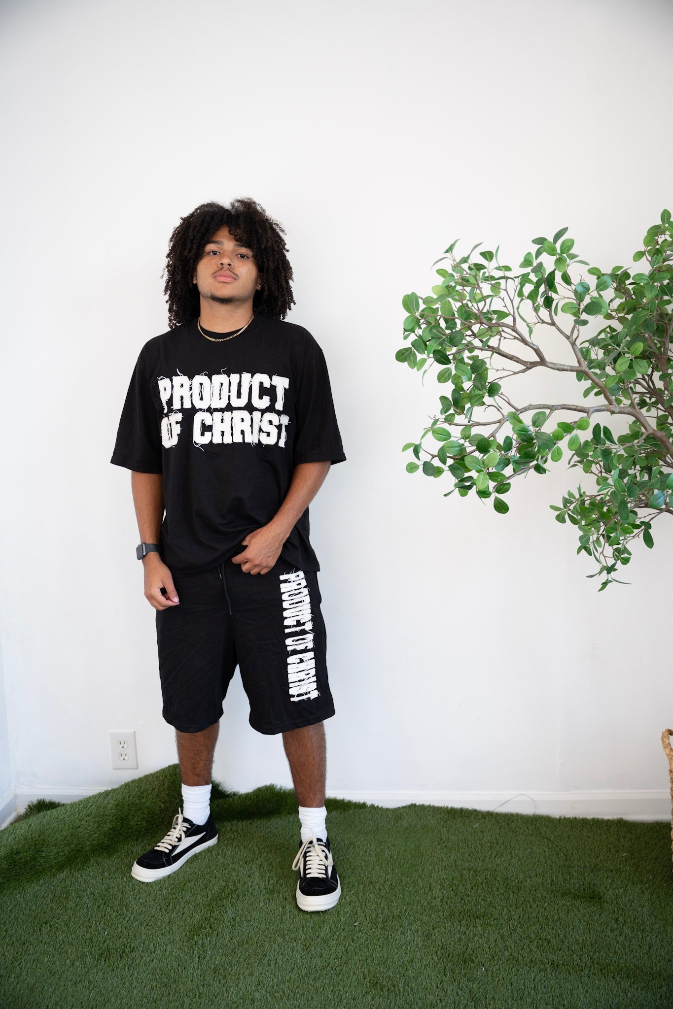 BLACK PRODUCT OF CHRIST SHIRT